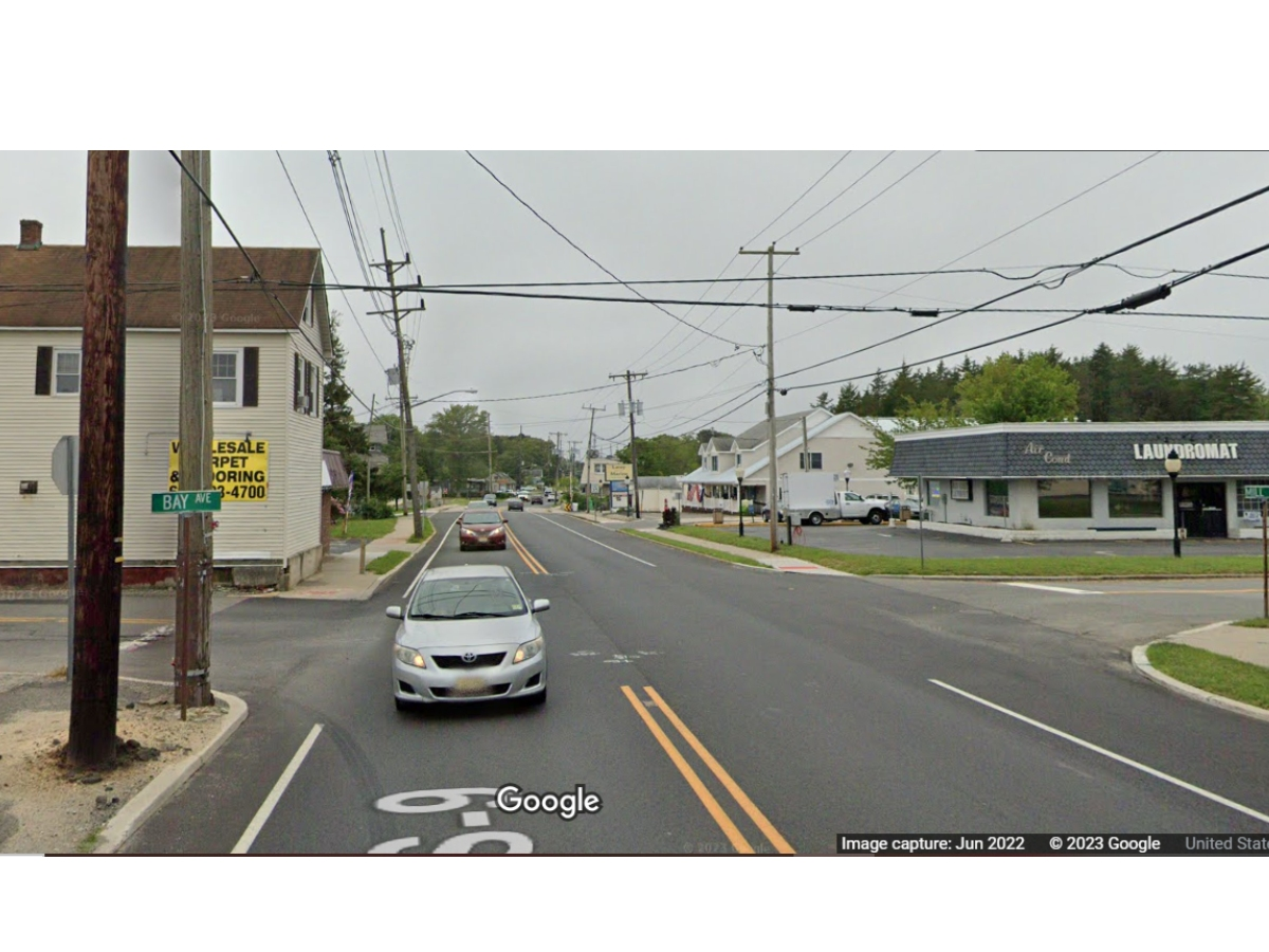 The carpet outlet (left) will be razed, while the laundromat (right) will see a second floor addition.