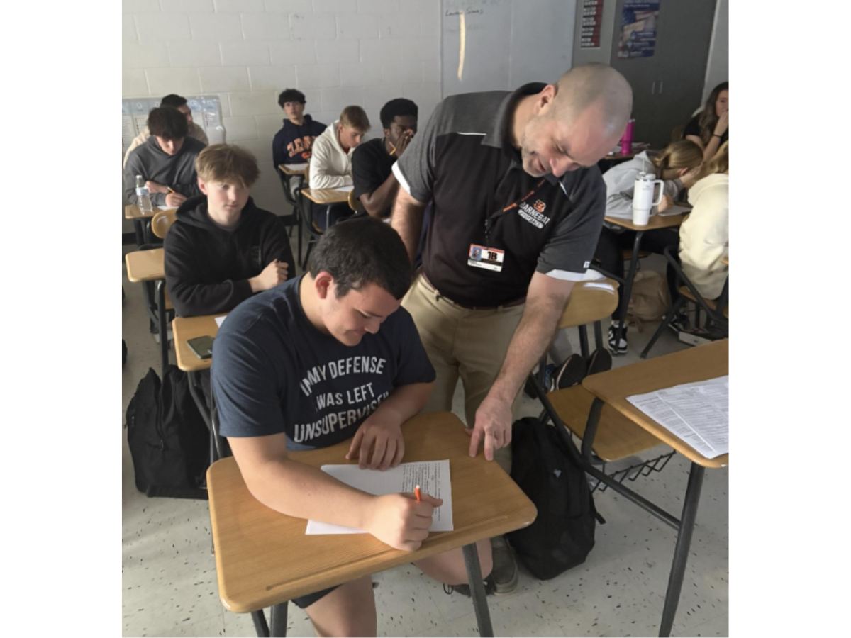 AP history teacher Kevin Smith and BHS junior Ricardo Villanueva 