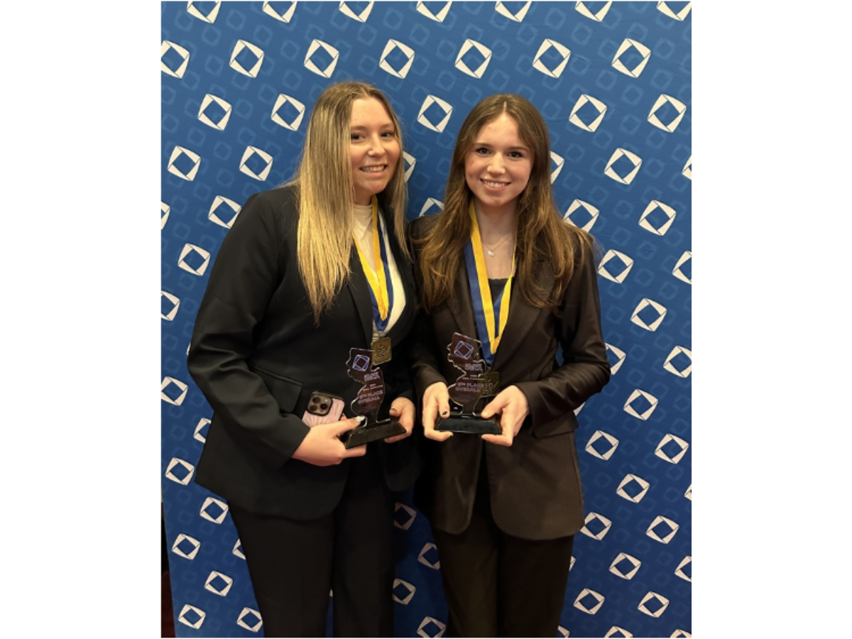 Leah Drewnowski (left) and Dani Ritzel celebrate their wins at the New Jersey State Career Development Conference. 