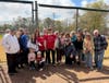 Mr. Myles surrounded by family and friends on Opening Day 2026, celebrating a legacy that has impacted generations of players since founding the league in 1973.