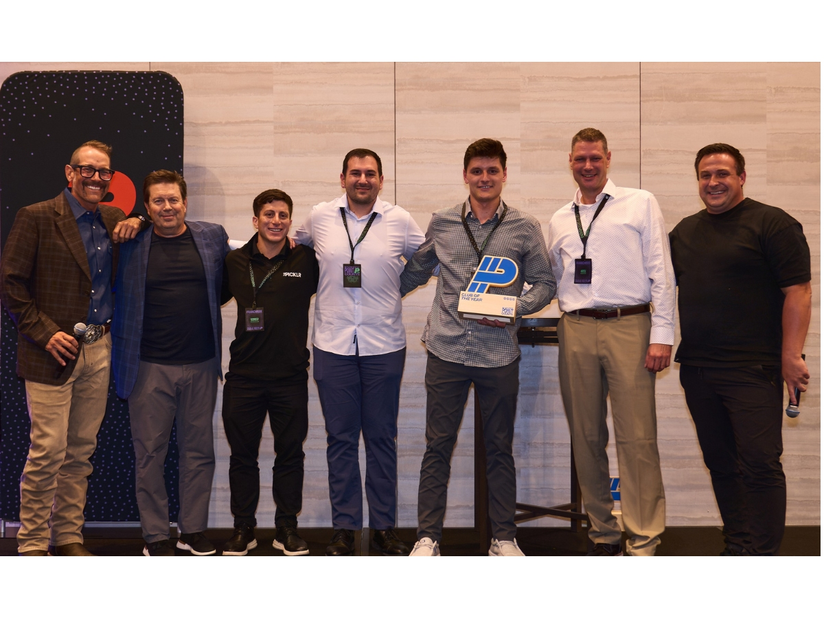 Matt PaneGase, Picklr VP, Pickleball Programming, Partnerships and Pro Shop (far left) and Austin Wood, Picklr co-founder (far right) present Tom Neale (second from left) CEO of Arete Sports Group/CrossCourt PC.