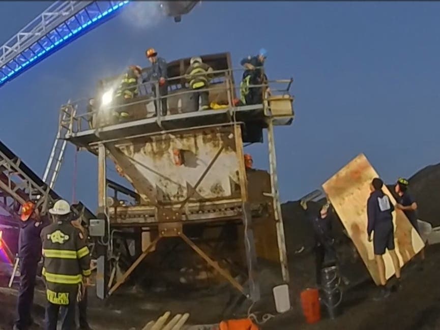 A Mays Landing man was rescued after being trapped under asphalt in a bin for about two and a half hours Tuesday, Egg Harbor Township police said.