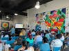 Families gathered for the summer program's mandatory parent workshops.