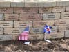 Family and friends leave mementos at their loved ones’ bricks at the site of the American Airlines Flight 191 Memorial Wall and Garden in Lake Park, 1021 Touhy Avenue at Lee Street in Des Plaines, IL.
