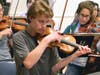 Hoff-Barthelson's Festival Orchestra rehearses for a concert.