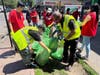 Volunteers pick up litter on 31st Street.