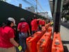 Volunteers pick up litter on 31st Street.