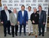 Mayor Fulop (3rd from right) and KRE Group President Jonathan Kushner (center) joined principals from National, municipal officials, union representatives and building tradespeople at the topping out ceremony of third and final Journal Squared Building