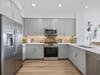 Model residence kitchen at The Pearl at Station Bay