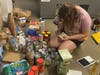 Youth volunteer Samantha Trybula sorting donations