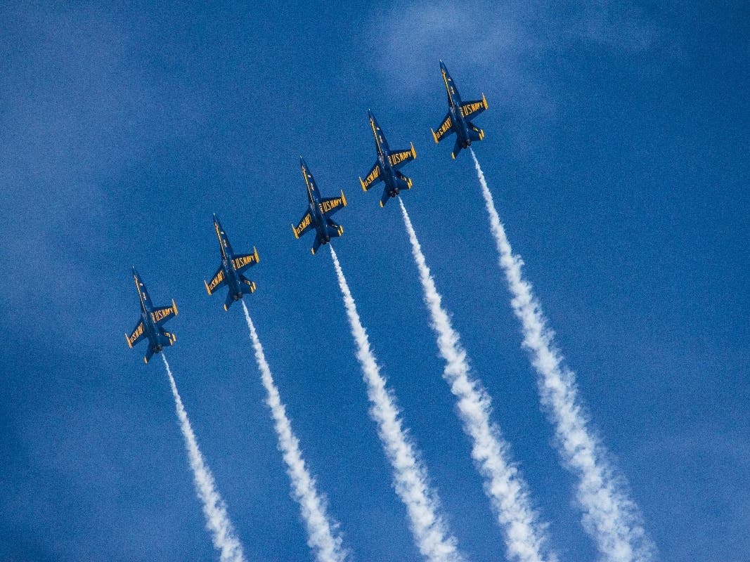 Photo of blue angels flying in formation. 