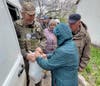 Delivering aid in the village of Pryvillia in Donetsk Oblast