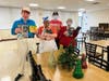 Recreational Therapist Stephanie Wingo (third from left) gives a thumbs up as participants proudly share some of the gifts they received from the Rotary Club of Orland Park. 