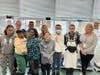 Transition Town students and teachers gather for a group photo after completing their work at NAWS Humane Society on April 3.