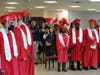 The Class of 2023 wore red caps and gowns for the May 23 graduation ceremony at Kennedy School in Tinley Park.