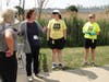 St. Coletta’s of Illinois Chief Operating Officer Heather Benedick (center) discusses plans for a garden bed with volunteers from Baird & Warner.