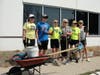 A team of volunteers from Baird & Warner’s Downers Grove office gets ready to dig up weeds and roots from an overgrown garden bed at St. Coletta’s of Illinois. The nonprofit plans to use the garden bed to grow pumpkins for its annual Fall Fest celebration