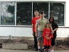 Supporting Maksym Sierak as he worked on his Eagle Scout project were his parents, Andy and Dorata Sierak, as well as his sister Isabella. Here, they stand in front of the garden area he later beautified for his Eagle Scout project.