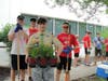 Daylilies were among the perennials Life Scout Maksym Sierak (center) selected to plant at St. Coletta’s of Illinois on July 15. 