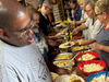 Members of All Saints Lutheran Church serve up hamburgers, hot dogs and homemade side salads to participants of St. Coletta’s of Illinois’ Community Day Services program on June 5.