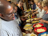 Members of All Saints Lutheran Church serve up hamburgers, hot dogs and homemade side salads to participants of St. Coletta’s of Illinois’ Community Day Services program on June 5.