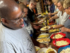 Members of All Saints Lutheran Church serve up hamburgers, hot dogs and homemade side salads to participants of St. Coletta’s of Illinois’ Community Day Services program on June 5.