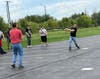 Nick T. swings for the fences after enjoying a picnic lunch at All Saints Lutheran Church in Orland Park.