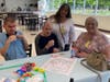 Former teachers reunited with their now grown-up students at a heartwarming get-together June 21 at St. Coletta’s of Illinois.