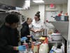 Instructor Amy Quinn reviews with a student how much butter they’ll need to make the stuffing.