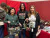 St. Coletta’s Chief Financial Officer Geraldine Fernando, AR/AP Manager Laura Vander Meulen and HR Director Gladys Ramirez enjoy shopping and supporting local talent at the Kennedy School Dessert & Craft Fair.