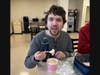 Kevin C., a participant in St. Coletta’s adult services program, enjoys every bite of his custom-made ice cream sundae at the special event hosted by All Saints Lutheran Church.