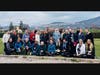 All 33 pilgrims from ministries sponsored by the Sisters of St. Francis of Assisi gather for a group photo outside Assisi with their guides, Sr. Joanne Schatzlein, OSF, and Fr. Jim Gannon.