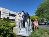 Camille, a Kennedy School student, and Farrakhan, a CDS participant, place a wreath of flowers on the statue of Mary during St. Coletta’s May Crowning ceremony on May 16, with assistance from CEO Heather Benedick and teacher Leslie Chowaniec.