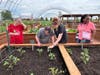 Ronna, Billy, Debbie Macenas and Deareo inspect the pepper and tomato plants they’ve been nurturing at Navarro Farm. Their hands-on gardening helps cultivate confidence, responsibility and a deeper connection to nature.