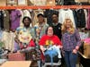 Student stylists at Kennedy School gather in their “Personally Styled Fashions” workshop, where they sort, fold and coordinate donated clothing from Toy Box Connection. The project helps them build life and vocational skills while spreading joy to staff.