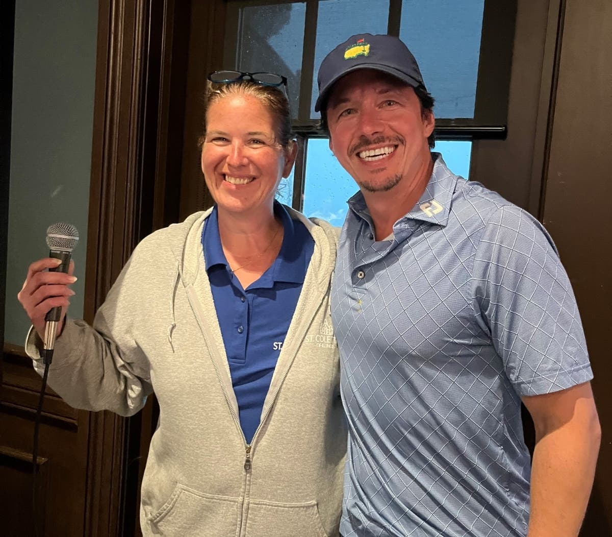 St. Coletta’s CEO Heather Benedick congratulates Ryan Kowalis, winner of the Lexus Champions for Charity raffle.

