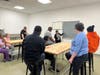 Bakery Manager Elsa Espinosa Diaz provides an overview of St. Coletta’s Bakery Job Training Program on the first day of the four-week training, outlining the skills participants will learn as they prepare for paid employment in a real-world bakery setting
