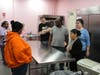 Bakery Manager Elsa Espinosa Diaz leads participants in St. Coletta’s Bakery Job Training Program on a behind-the-scenes tour of the Coletta’s Crossing Bakery, where individuals with developmental disabilities are gaining hands-on experience.