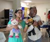Prom King Najee L. and Prom Queen Jesna J. strike a post after being crowned.