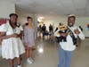 All smiles and a thumbs up from Prom King Najee L., just moments after being crowned by Andrew High School students.