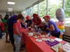 A participant decides which toppings he wants on his ice cream sundae.
