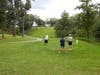Sister Maryann Dosen tees off against two golfers during the popular “Beat the Nun” challenge at the 37th Annual Kennedy Golf Outing. For a $25 donation, golfers had the chance to beat Sister Maryann’s shot.
