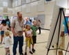 An enthusiast family viewing the exhibition