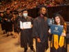 Members of the Class of 2022 bask in the glory of commencement exercises in a packed XL Center in Hartford.