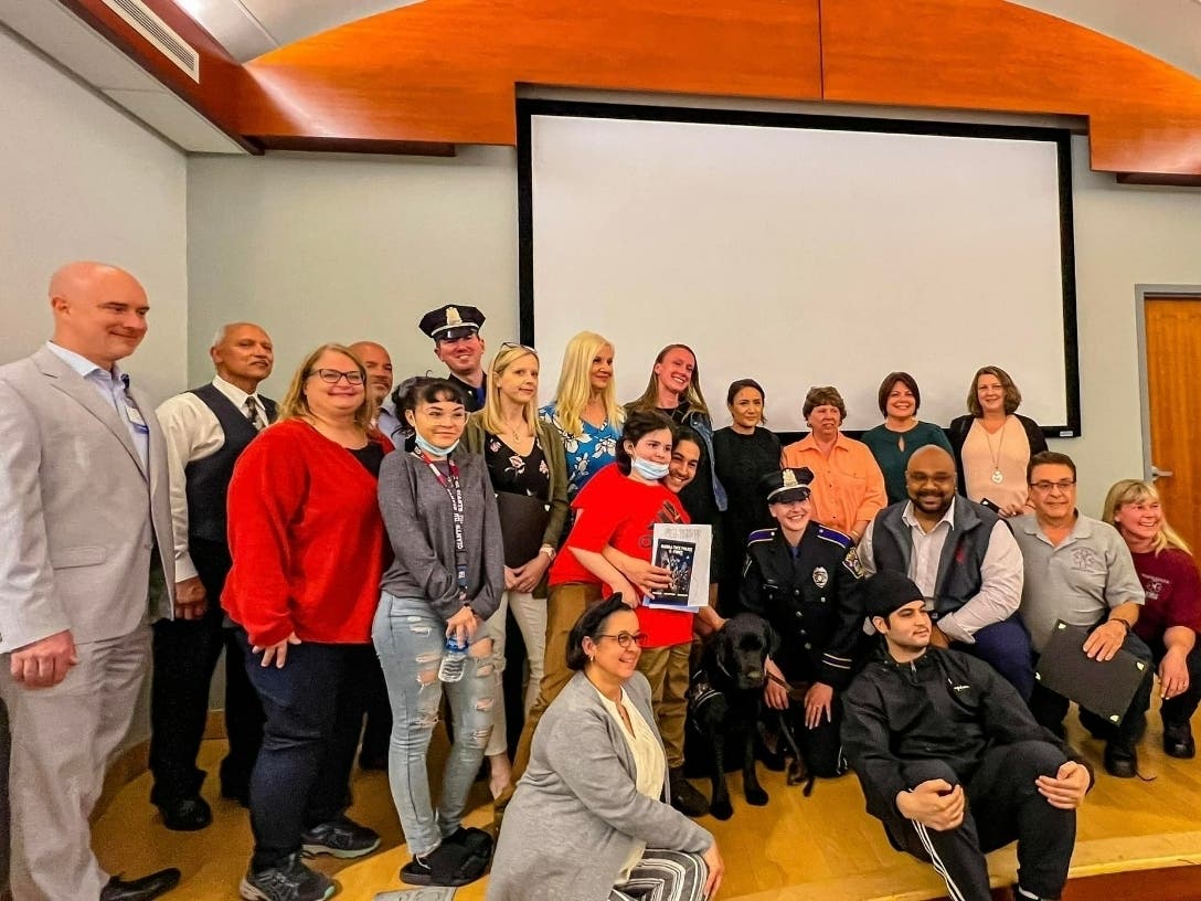 A large throng of police, responders and community members from Naugatuck were at Waterbury Hospital Wednesday to celebrate those who saved a 10-year-old boy's life after a medical emergency at a Naugatuck school last month.