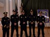 West Hartford Police Department officials flank those who were promoted Wednesday.