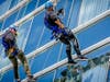 Sgt. Donald MacKenzie and dispatcher Jose Luna-Peguero of the Southington Police Department last Friday braved the heights to raise money for Connecticut Special Olympics.