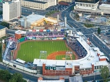 Dunkin Donuts Park in Hartford will host a benefit softball tournament featuring area fire and police departments on Saturday.