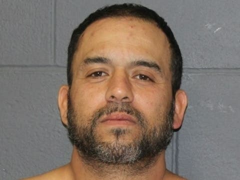 Southington police announced Saturday morning that 43-year-old Meriden resident Victory Perez was charged with the murder of a Waterbury man found in a smashed vehicle early Thursday morning.
