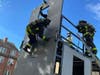 West Hartford firefighters Monday trained on new equipment that will help them quickly escape the exterior of a building from the upper floors. The equipment was funded via actor Denis Leary's foundation.